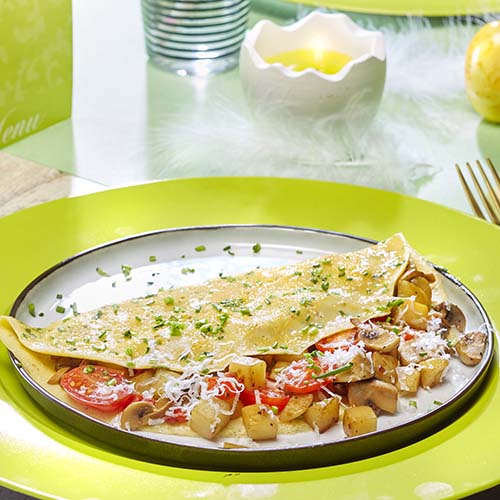 Gevulde omelet met groentepannetje en geitenkaas