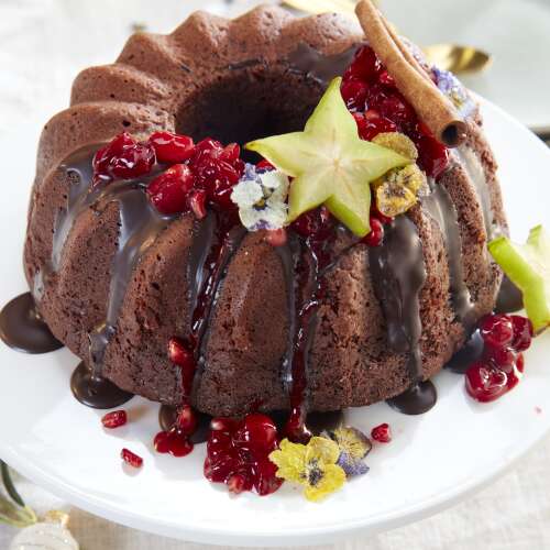 Recette Pour Couronne De Noel Au Chocolat Compote D Airelles Et Violettes Cristallisees Colruyt En Cuisine