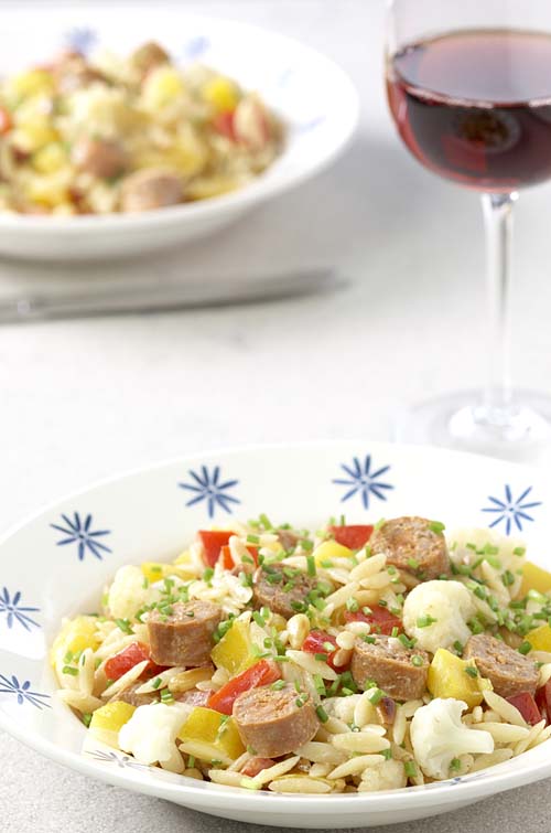 Pâtes grecques aux merguez, sauce tomate Colruyt